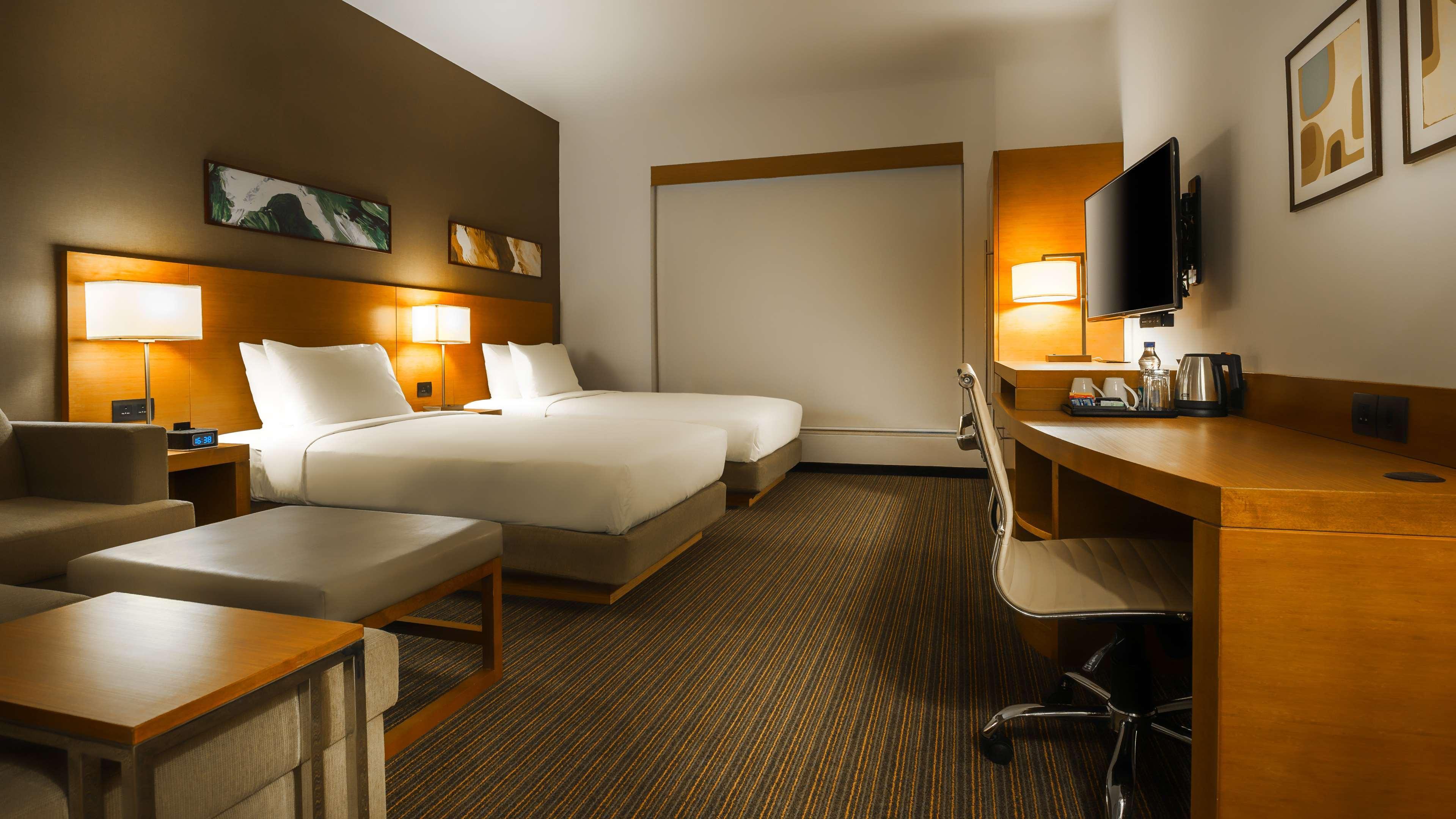 Hyatt Place Gurgaon Udyog Vihar Exterior photo A typical room at the Holiday Inn Express