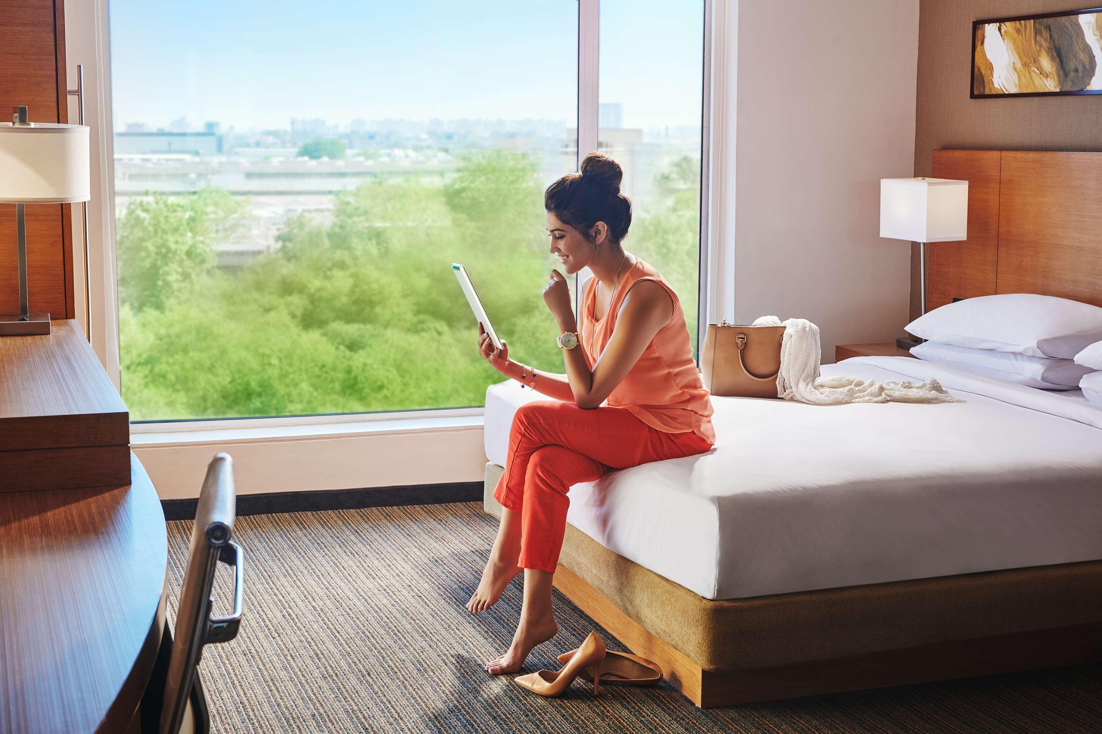 Hyatt Place Gurgaon Udyog Vihar Exterior photo A guest in a guest room at the Hilton Garden Inn